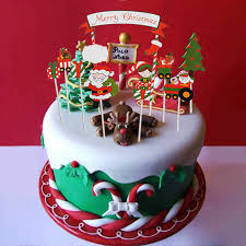 Close shot of a woman dusting a christmas fruit cake with icing. 1 Set 2020 Merry Christmas Cake Topper Christmas Tree Santa Claus House Cupcake Topper For Christmas Party Cake Decorations Xmas Cake Decorating Supplies Aliexpress