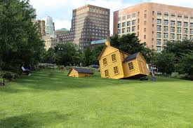 sinking yellow house on the greenway