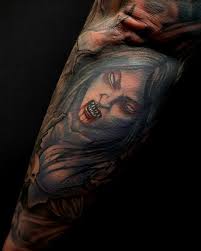 Scourge Tattoo Artist added a new...