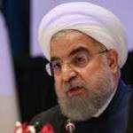 decide Iran world? Rouhani rejects
