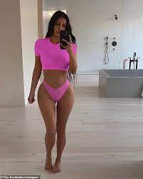 Kim Kardashian poses in racy neon after revealing Kanye West declared her  career 'over' | Daily Mail Online