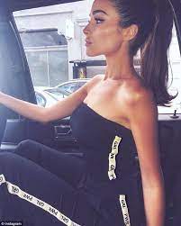 Olivia Culpo Works Black And White Jumpsuit Olivia Culpo Style Olivia Culpo Olivia Culpo Hair