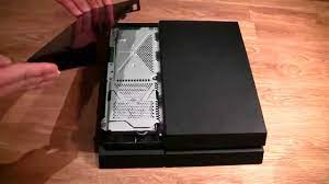 Pull firmly on the front corners and front edge. How To Clean Dust From Ps4 To Keep It From Overheating Youtube