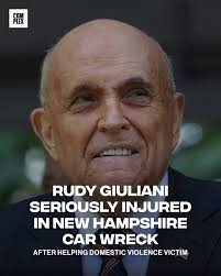 Former NYC Mayor Rudy Giuliani was hospitalized after a car accident in New  Hampshire Saturday night, suffering a fractured vertebrae and multiple  injuries. The crash occurred after he stopped to help a