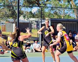 Julia Allan-Goodwin passes to Rhian Moresi