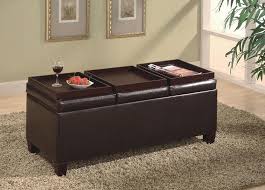 Storage ottomans are a chic and clever way to hide and organize extra throw blankets, remote controls and magazines. Vinyl Storage Ottoman With Three Trays Miami Direct Furniture