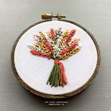 Show off your cross stitch skills with these embroidery patterns! Hand Embroidered Fall Wildflower Bouquet Floral Embroidery Patterns Simple Embroidery Flower Embroidery Designs