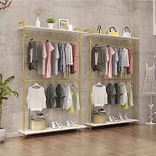 Store multiple items such as books, shoes, clothing or accessories on its two slat openings as this piece looks fashionable in a. Amazon Com Mdepyco Modern Simple Industrial Pipe Double Hanging Rods Clothing Rack Retail Display Wall Mounted Storage Clothes Hanging Shelf 2 Tier Wood Garment Rack One Shelves Gold 47 2 L Home Improvement