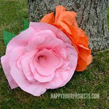 The colors of the flowers can be adapted. How To Make Giant Crepe Paper Flowers Happy Hour Projects