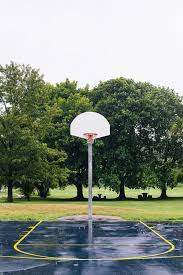 No need to register, buy now! An Empty Basketball Court After The Rain By J Danielle Wehunt