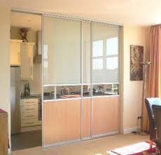Aside from the fact that they look great and give your kitchen an entirely new personality, there are a number of other reasons why going with glass kitchen doors for your remodel is a smart idea. Sliding Glass Doors Kitchen Photo Gallery Cabinet Door Designs Kitchen Cabinets Sliding Doors Kitchen Glass Doors