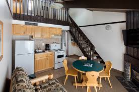 Updated in 2016, these loft style industrial apartments are smoke free, feature high ceilings, massive windows, exposed brick walls and original walls and columns. Loft Apartment At The Rocky Mountain Ski Lodge In Canmore