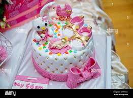 Pink And White Theme Cake For Baby Newborn Boy Birthday Cake Children S Shoes It S A Boy Baby Shower Cake Stock Photo Alamy
