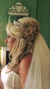Wedding Hair Extensions Used To Create Dramatic Volume And Curl Hair To The Side With Tiara And Bride Hairstyles Veil Hairstyles Wedding Hairstyles With Veil