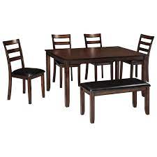 A dining room table and chairs may regularly sit four or six people, but what happens when it's your turn to host a holiday dinner? Signature Design By Ashley Coviar D385 325 Burnished Brown 6 Piece Dining Table Set With Bench Furniture And Appliancemart Table Chair Set With Bench