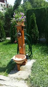 Pallet Style Garden Fountain With Pot Basin And Hose Holder Own Project Wasserhahn Garten Wasserzapfsaule Garten Wasser Im Garten