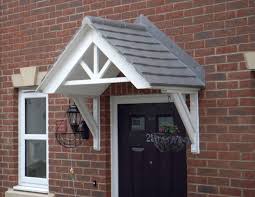 Front door porch porch roof front doors hip roof design cottages and bungalows historical architecture roofing contractors gable roof flat roof in this article you will find all the tips necessary to choose the right type of roof for your home. Man Friday Grp Mouldings Grp Door Canopies