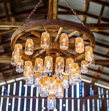 Wagon Wheel Chandelier Canada Google Search Mason Jar Chandelier Jar Chandelier Mason Jar Lighting
