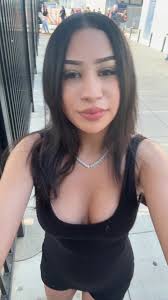 Latina Girl with Straight Hair and Green Shirt