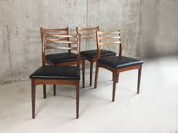 Set Of Four English Mid Century Teak And Black Vinyl Dining Chairs By Meredrew 1960s Dining Chairs Retro Furniture Vintage Furniture