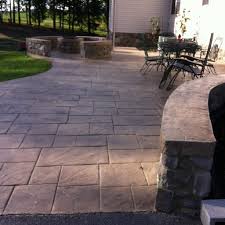 On a small scale, concrete is fairly easy to work with, but installing an entire patio can be a challenge. Lancaster Stamped Concrete Patio Builders Quality Installation