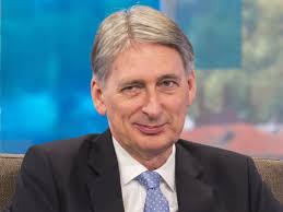 Millions affected by universal credit cuts to be partly compensated by  chancellor