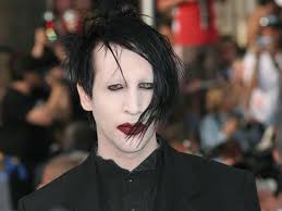 Marilyn manson will turn himself in on charges related to videographer assault, police chief says. Gloirqkmknslqm