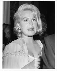 Sandra with Robert Wagner and (correction) James Farentino. A New Year's  Party at Universal. December 1967 or January 1968. Pam clipping.