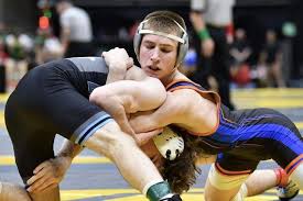Edison's Abe Hermes looks to get the advantage over Legacy Christian's  Nathan Attisano during their 126-pound semifinal match at the Division III  state championships inside the Jerome Schottenstein Center