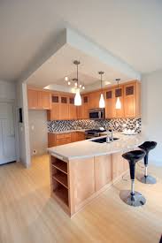 A breakfast bar is either a full kitchen island or a countertop overhang with a height that has enough room for the legs and a size that can. Curved Breakfast Bar Houzz