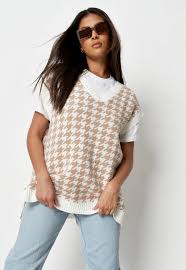 Choose from our limited quantity day dresses, occasion dresses and our bestselling fabulous wrap dresses. Tall Beige Houndstooth Knit Sweater Vest Missguided