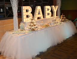 Winter themed baby shower on a limited budget of $100. Easy Ideas For An Amazing Winter Wonderland Baby Shower Tulamama