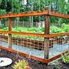 Build the frame of the gate and staple mesh across the front of it. 1