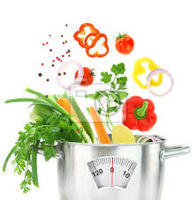 Fresh Vegetables Falling Into A Casserole Pot With Weight