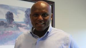 Deno Posey: Banker by day, comedian by night