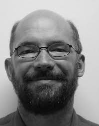 A Distributed and Privacy-Aware Speed Advisory System for Optimising  Conventional and Electric Vehicles Networks