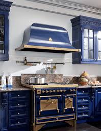 Royal navy on cabinets kitchen decor kitchen kitchen with rustic wood cabinetry and blue tile solid wood. Pin On Heart Of The Home