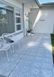 Starting in the top corner work your brush down the tiles to create a wet edge. Bunnings Warehouse Shopper Shares Bargain Hack To Transform Front Deck Using Dulux Paints 7news