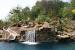 Mansion Backyard Pool With Waterfall