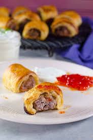 Score the top of each roll. Easy Sausage Rolls With Just 3 Ingredients Video Recipe The Flavor Bender