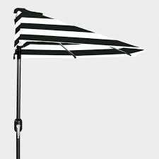 The outdoor 7' 5 market umbrella offers a wide range of shades for you to enjoy the outdoor scenery. Black Stripe Outdoor Half Umbrella World Market