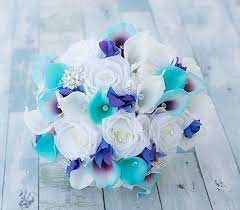 Real turquoise flowers for weddings. Beach Wedding Bouquet Tropical Bouquet Wedding Turquoise Purple Bouquet Turquoise Bouquet Orchid Bouquet Purple Blue Bouquet Callas Beach Wedding Bouquets Purple Wedding Bouquets Purple Wedding Flowers