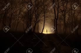 Alone Girl With The Light In The Forest At Night Or Blue Toned Stock Photo Picture And Royalty Free Image Image 72527264