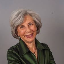 Dive into 1918, where Maggie Canavan steps out of her parent's shadows for  a summer in Greenwich Village, New York City. As she ignites her passion  for feminism, justice and love, the