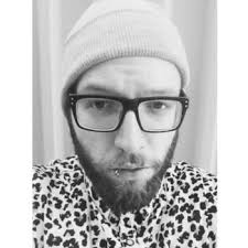 Christopher ; fresh fade with a hard part.