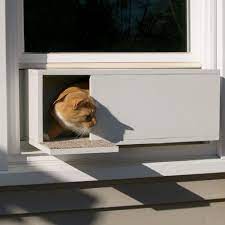 The Easy Mount Window Cat Door Hammacher Schlemmer Cat Door Cat Door Diy Cats