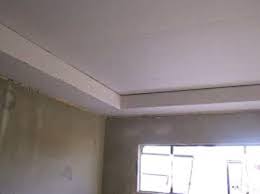 This house is designed for a family of three but whose needs require spacious high ceiling rooms. Living Room Rhinolite Ceiling Designs Living Room