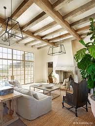 Desert Farmhouse With Warm Traditional And Rustic Interiors Cozy Living Room Design House Design Eclectic Farmhouse