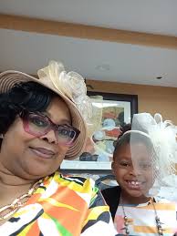 Grandma Amy beams with her children and grandchildren