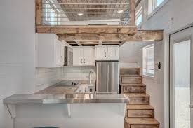 Tiny house interior should have space saver for the efficiency and practicality. Luxury Mobile Tiny House With Elegant Interiors And Drawer Style Staircase Idesignarch Interior Design Architecture Interior Decorating Emagazine